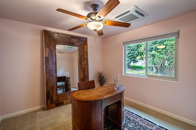 office featuring ceiling fan and light colored carpet