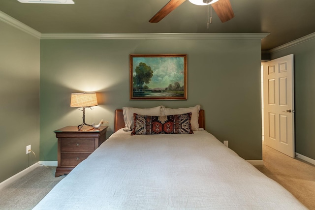 bedroom with carpet, ceiling fan, and crown molding