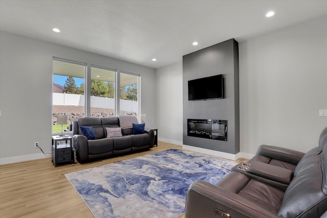 living room with light hardwood / wood-style floors