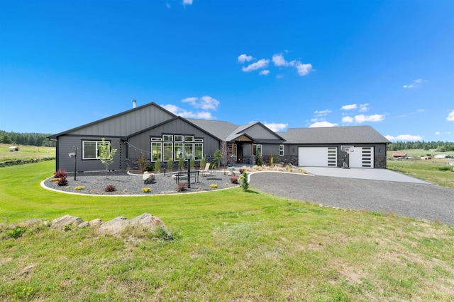 ranch-style house with a front yard and a garage