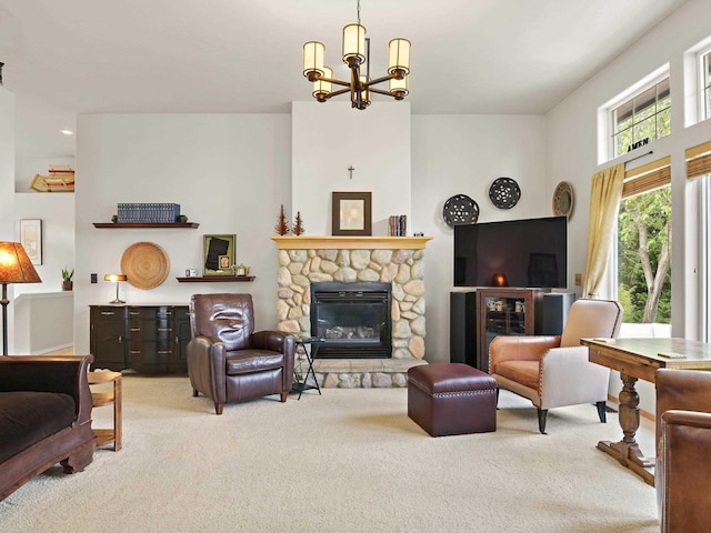 living room with a stone fireplace, light carpet, and an inviting chandelier