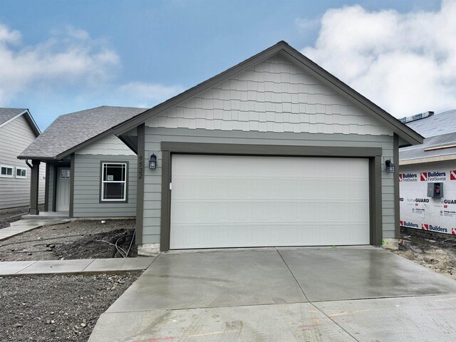 ranch-style home with a garage