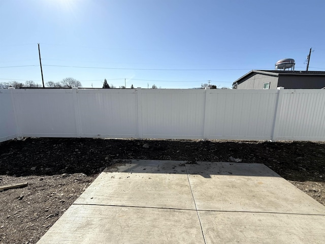 view of yard featuring a fenced backyard and a patio area