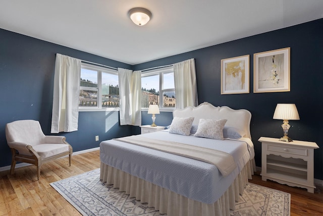 bedroom with light hardwood / wood-style flooring