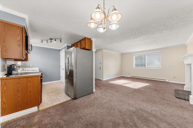 kitchen with light carpet, a textured ceiling, appliances with stainless steel finishes, a baseboard radiator, and a notable chandelier