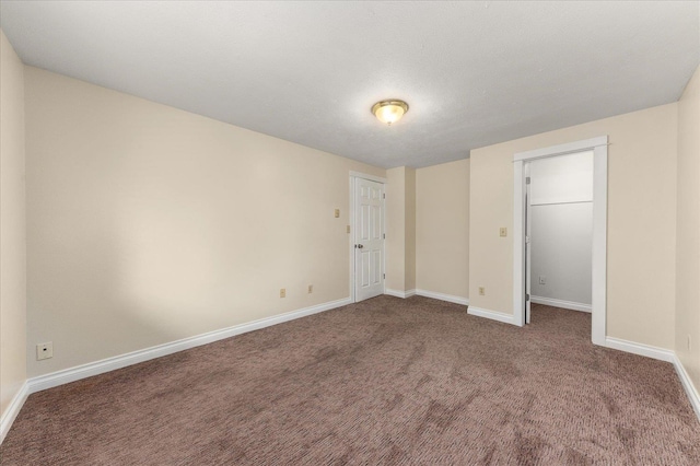 unfurnished bedroom featuring carpet flooring