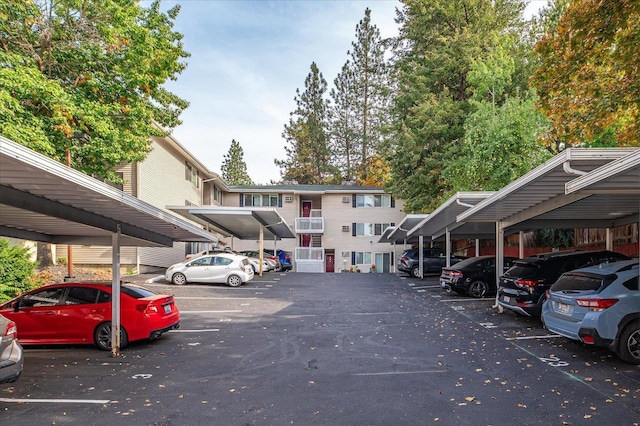 view of parking / parking lot with a carport