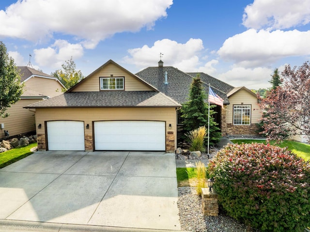 view of front of property with a garage