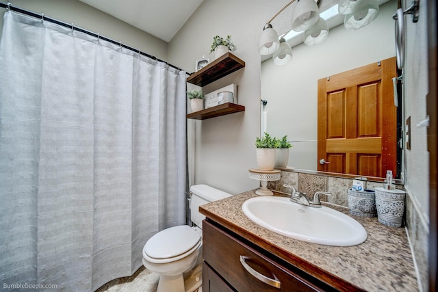 bathroom with walk in shower, vanity, and toilet