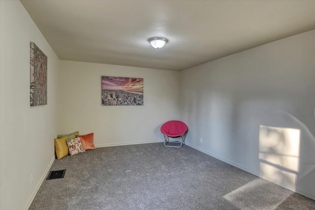 unfurnished room featuring carpet flooring