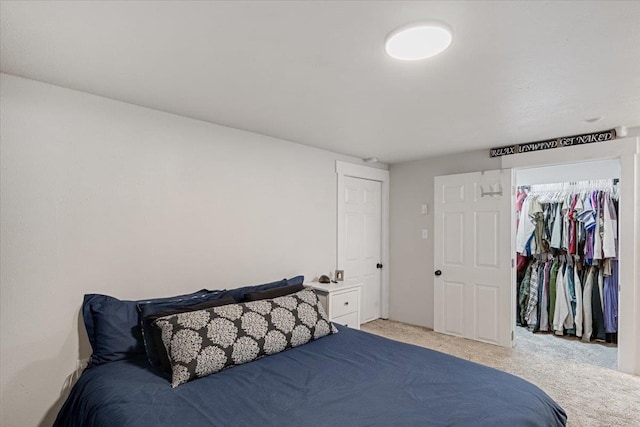 carpeted bedroom featuring a closet