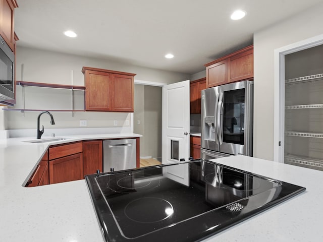 kitchen with appliances with stainless steel finishes and sink