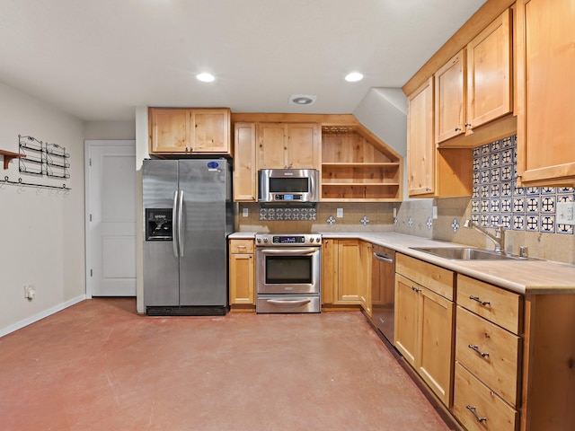 kitchen featuring light brown cabinets, sink, and appliances with stainless steel finishes