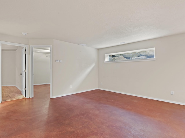 basement with a textured ceiling