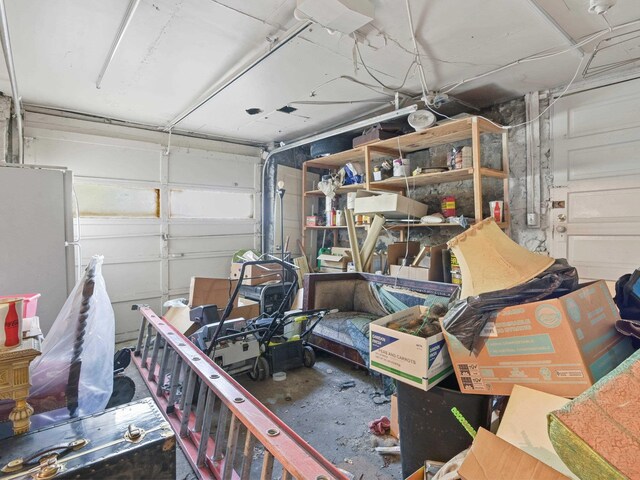 garage featuring white fridge