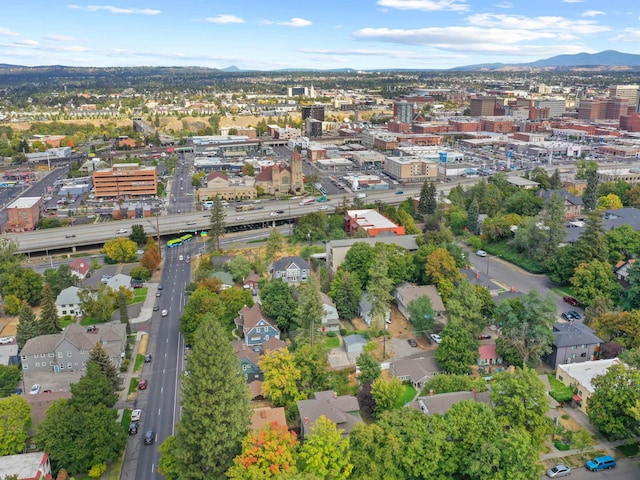 birds eye view of property featuring a mountain view