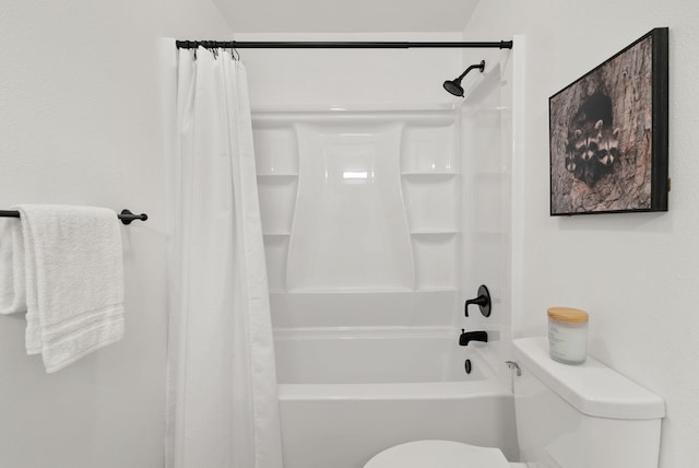 bathroom featuring shower / bathtub combination with curtain and toilet