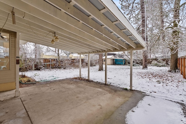 view of snow covered patio