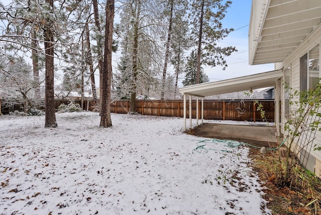 view of yard covered in snow