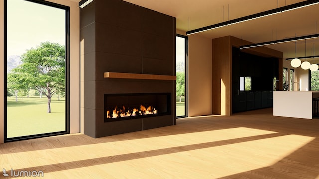 unfurnished living room with a large fireplace