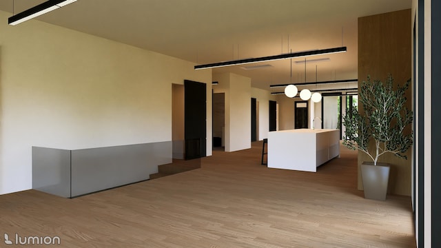 unfurnished room featuring light hardwood / wood-style flooring