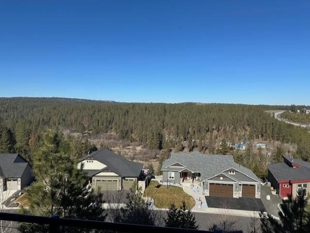 aerial view with a wooded view