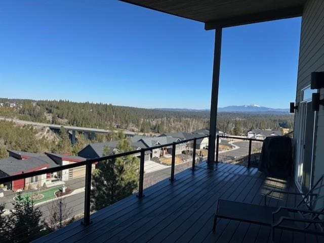 wooden terrace with a mountain view