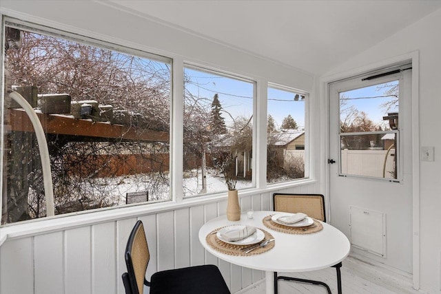 sunroom / solarium with lofted ceiling