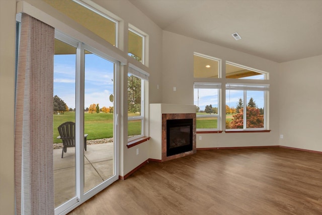 unfurnished living room featuring hardwood / wood-style floors