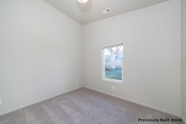 unfurnished room with carpet floors