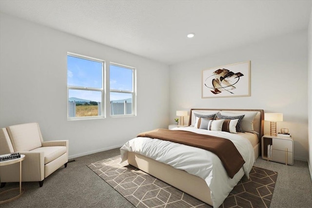 bedroom with recessed lighting, carpet flooring, and baseboards