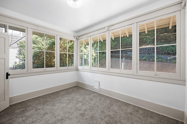 unfurnished sunroom featuring a healthy amount of sunlight