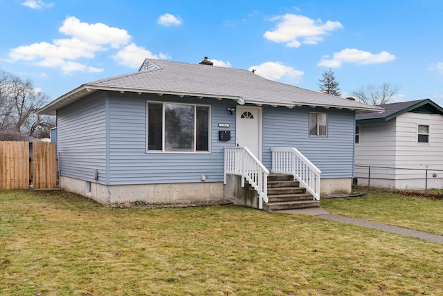 view of front of property with a front lawn