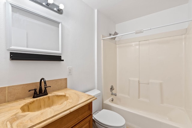 full bathroom with vanity, shower / bath combination, and toilet