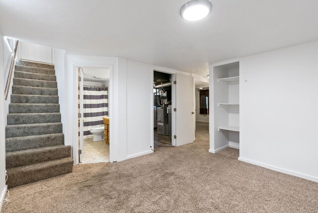 interior space featuring light colored carpet