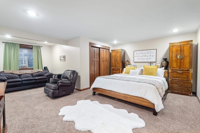 bedroom with carpet floors and a closet