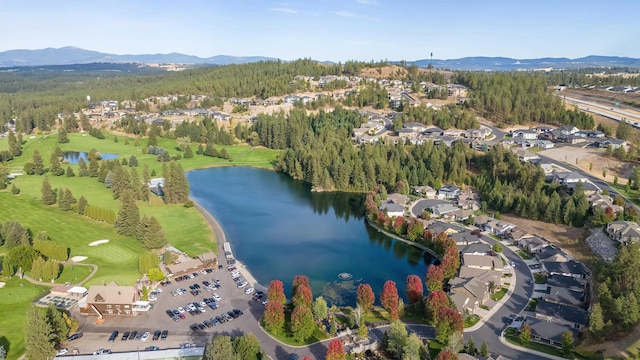 aerial view featuring a water and mountain view