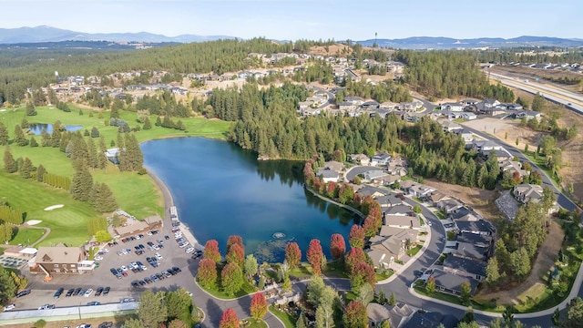 birds eye view of property featuring a water and mountain view