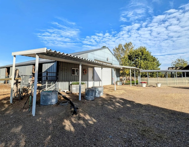 exterior space featuring an outbuilding