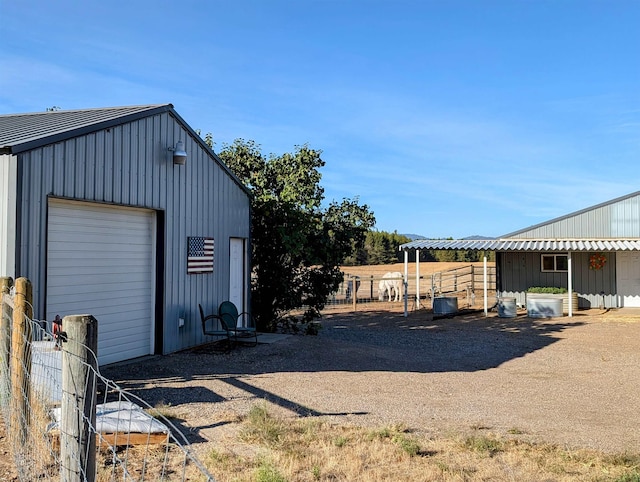 view of outbuilding featuring a garage