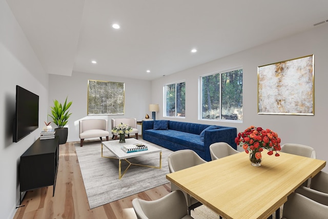 interior space featuring light wood-type flooring and an inviting chandelier