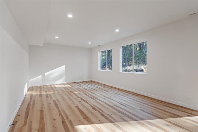 unfurnished dining area with light hardwood / wood-style flooring