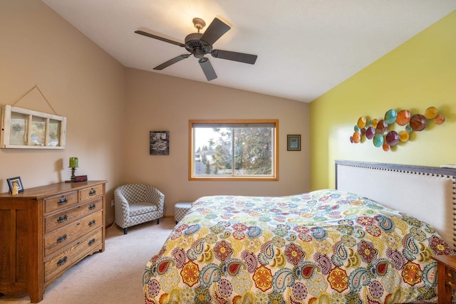 bedroom with light colored carpet, ceiling fan, and lofted ceiling