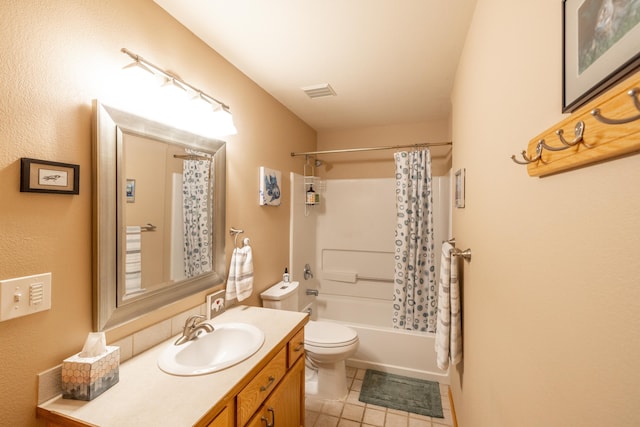 full bathroom with shower / tub combo, vanity, toilet, and tile patterned floors