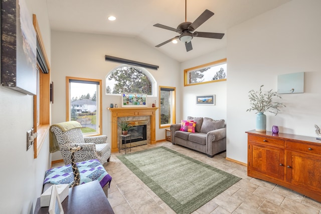 living room with vaulted ceiling and ceiling fan