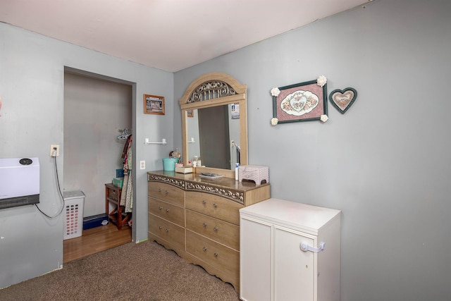 bathroom featuring heating unit