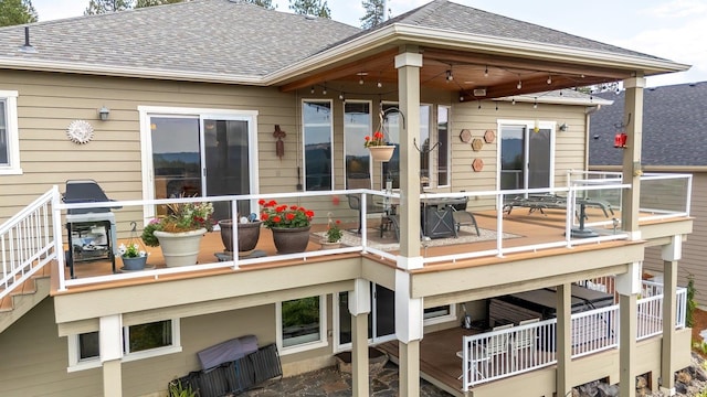 rear view of house with a balcony