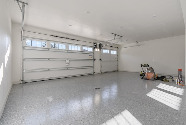 garage featuring baseboards