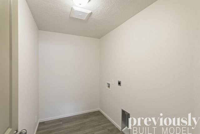 laundry room featuring washer hookup, dark hardwood / wood-style floors, hookup for an electric dryer, and a textured ceiling