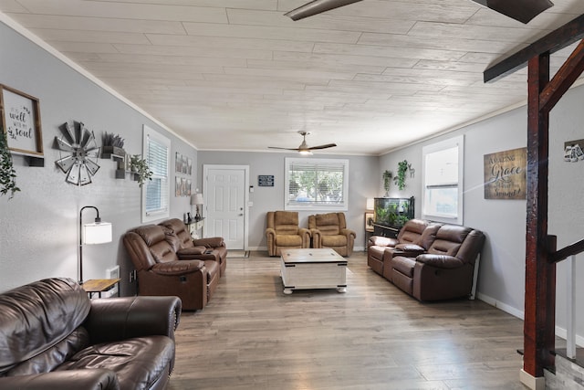 living room with ceiling fan, light hardwood / wood-style floors, wood ceiling, and ornamental molding